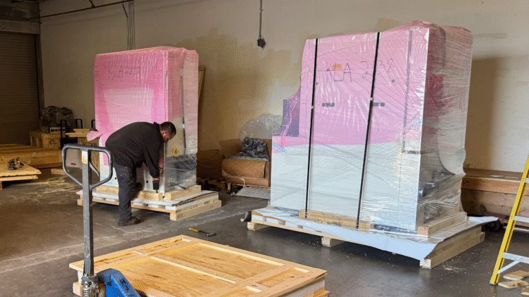 Semiconductor device secured in anti-static pink wrap for ESD protection during shipping.