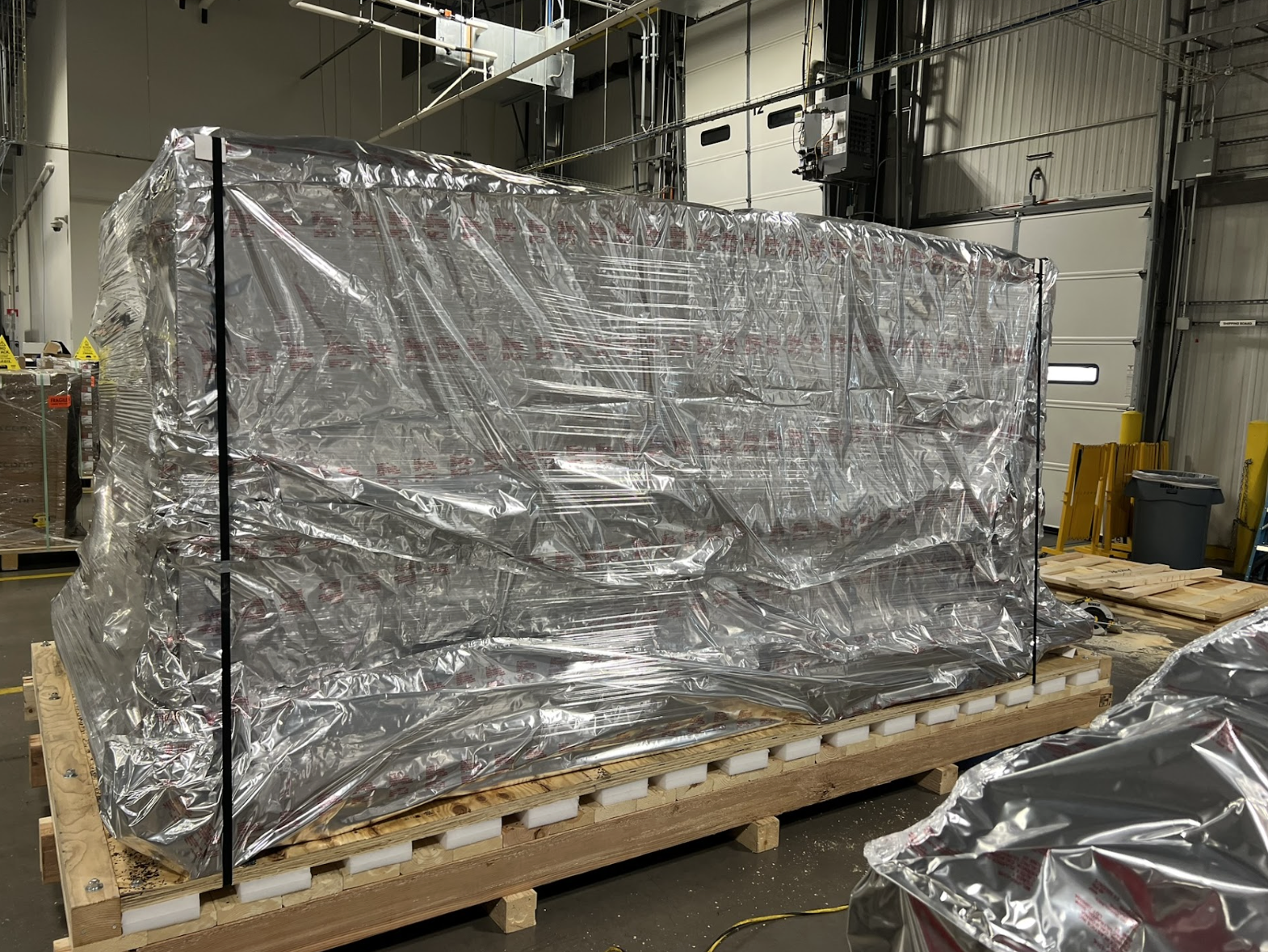 Custom-crating-and-packaging-process-with-foam-fabrication-and-vapor-wrap-for-export-packaging-services